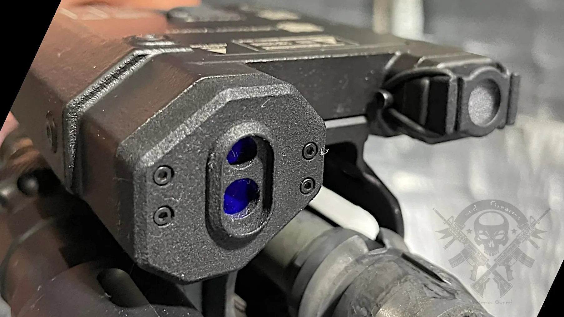 Close-up of US Night Vision Designate IR-V laser system showing control panel, remote ports, and IR output lens