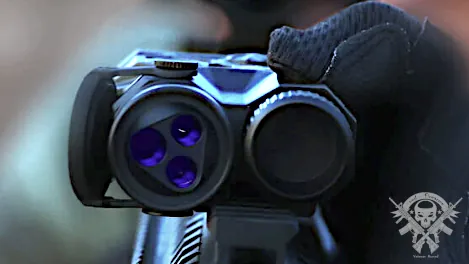 Close-up of the RIX RIP-3C IR laser device showing three laser lenses including green visible, IR pointer, and central VCSEL flood, photographed from a front-facing tactical angle.