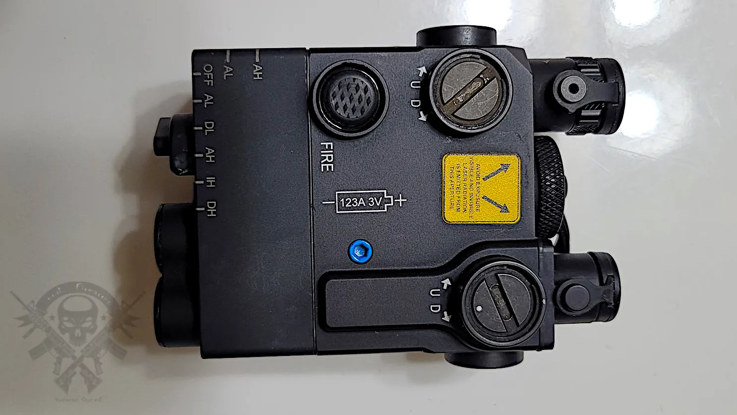 Top-down view of Steiner DBAL-A3 showing rotary mode dial, laser labels, and activation buttons