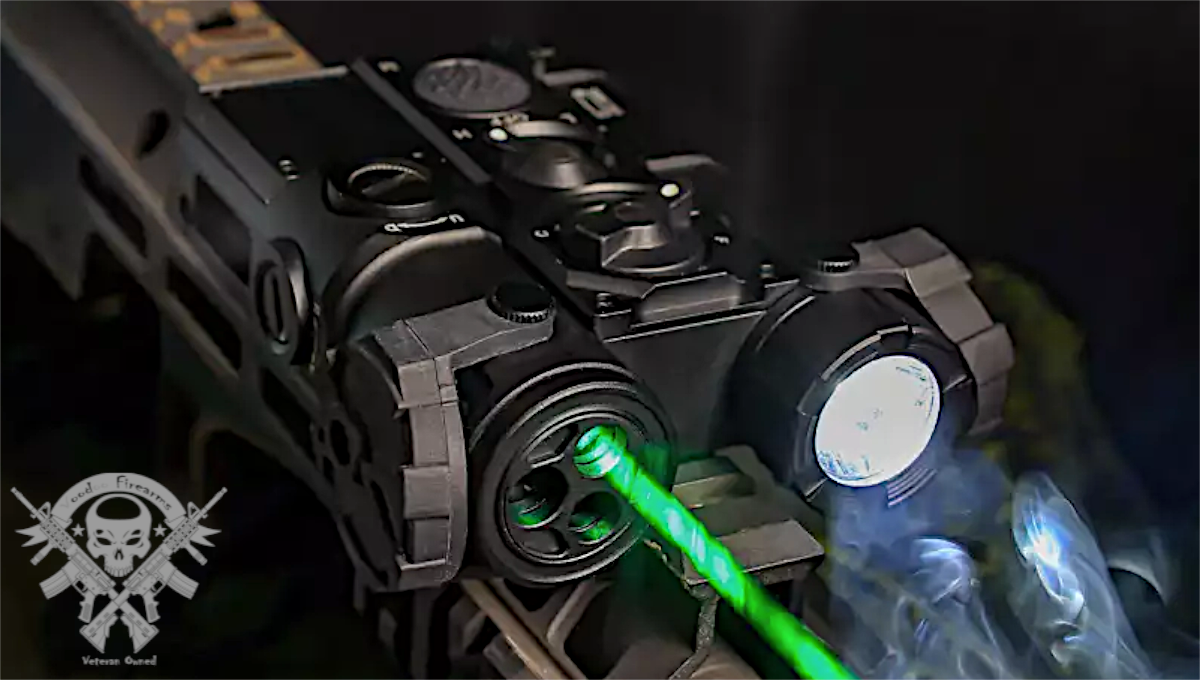 AGM WLAD-3B laser system mounted on AR-15 with visible green laser and IR floodlight activated during nighttime demo