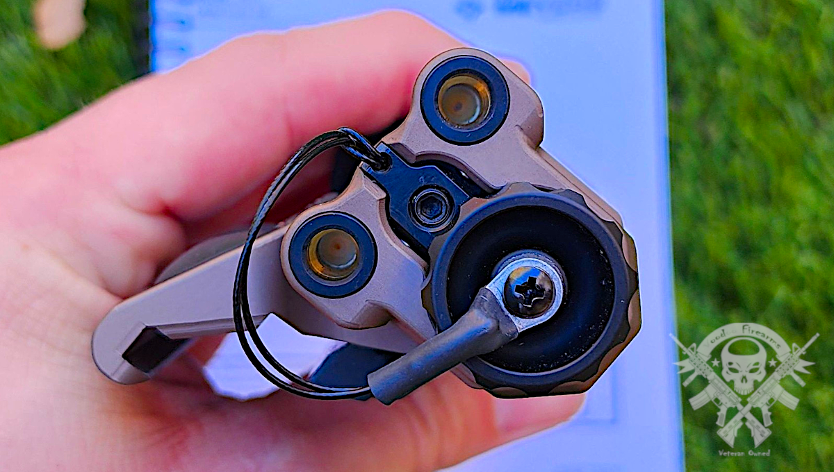 Rear view of BE Meyers MAWL C1+ IR laser showing windage and elevation adjustment dials and rear switch port