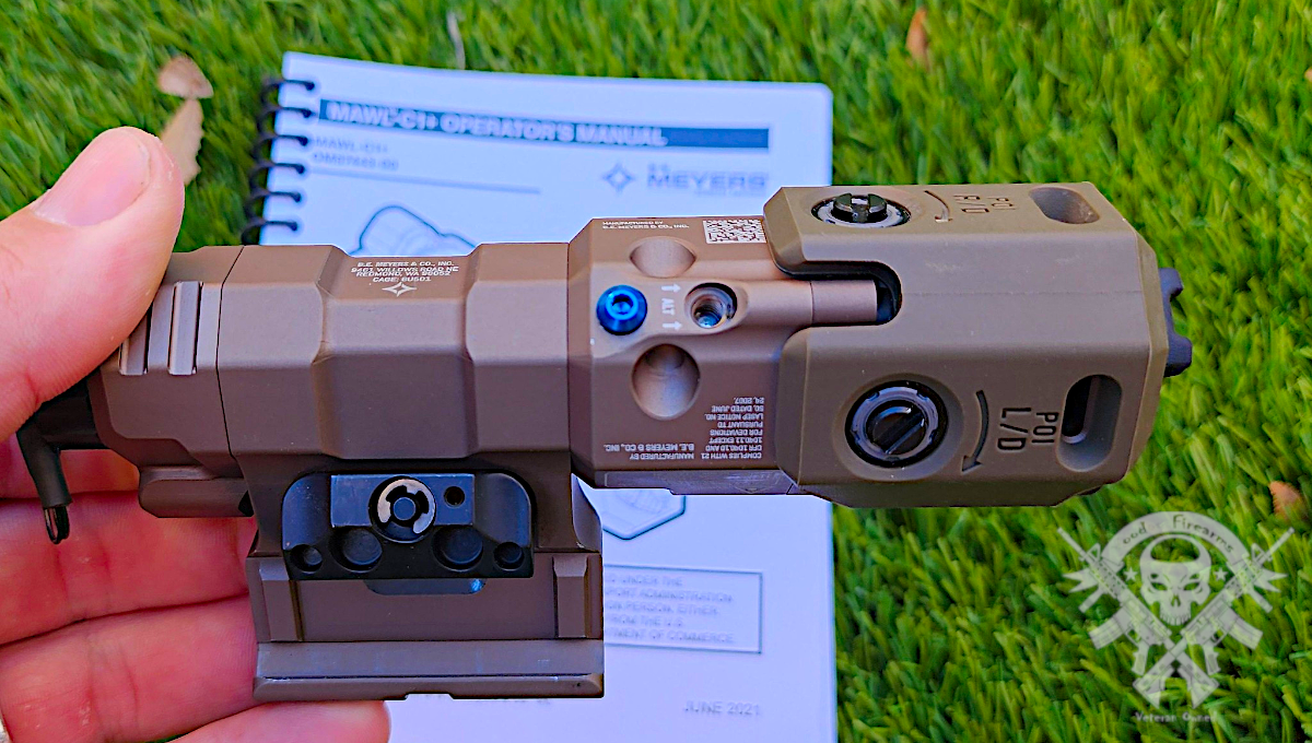 Side view of BE Meyers MAWL C1+ infrared laser showing modular body, activation paddles, and mounting layout