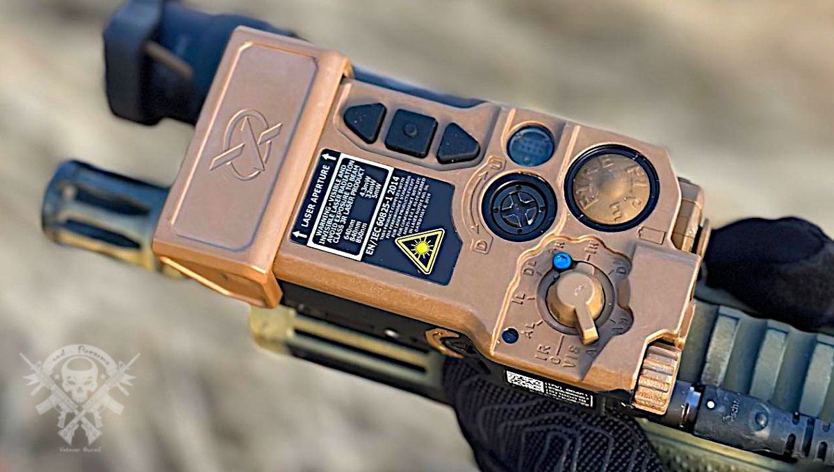 Wilcox RAID-Xe Low Power IR laser and illuminator mounted on AR-15 rifle with accessories