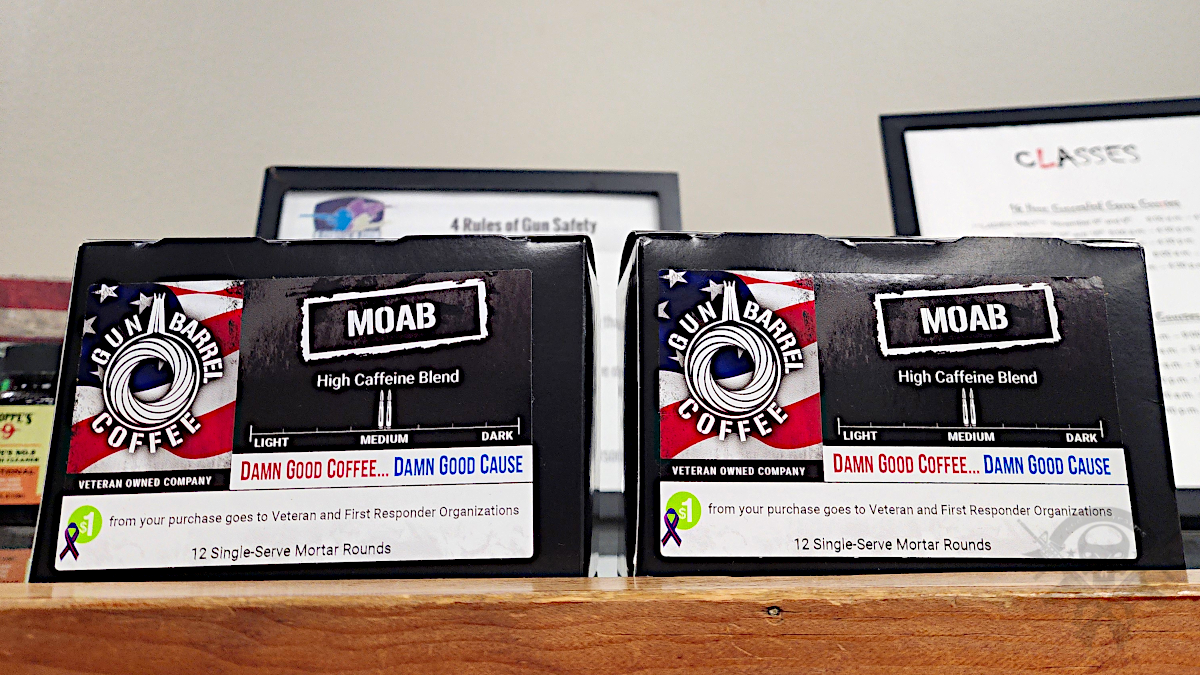 Gun Barrel Coffee MOAB K-Cup boxes on display featuring high-caffeine blend branding and veteran-owned messaging.**