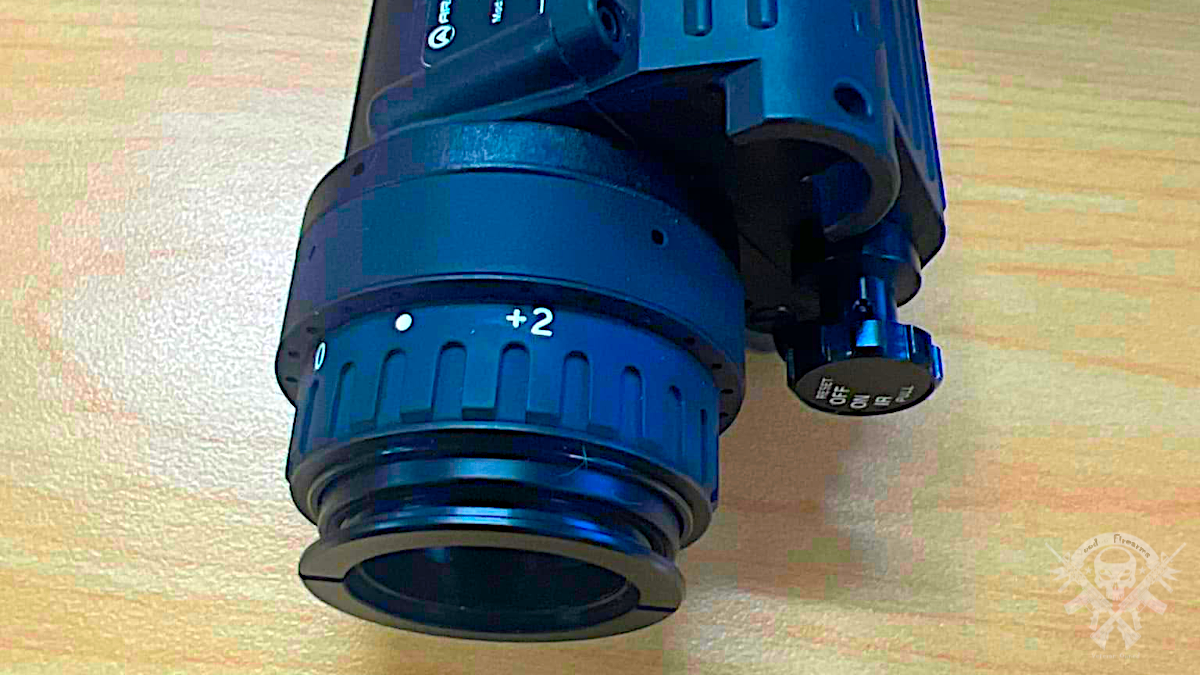 Armasight PVS-14 Gen 3 Pinnacle night vision monocular detail view showing focus ring and housing